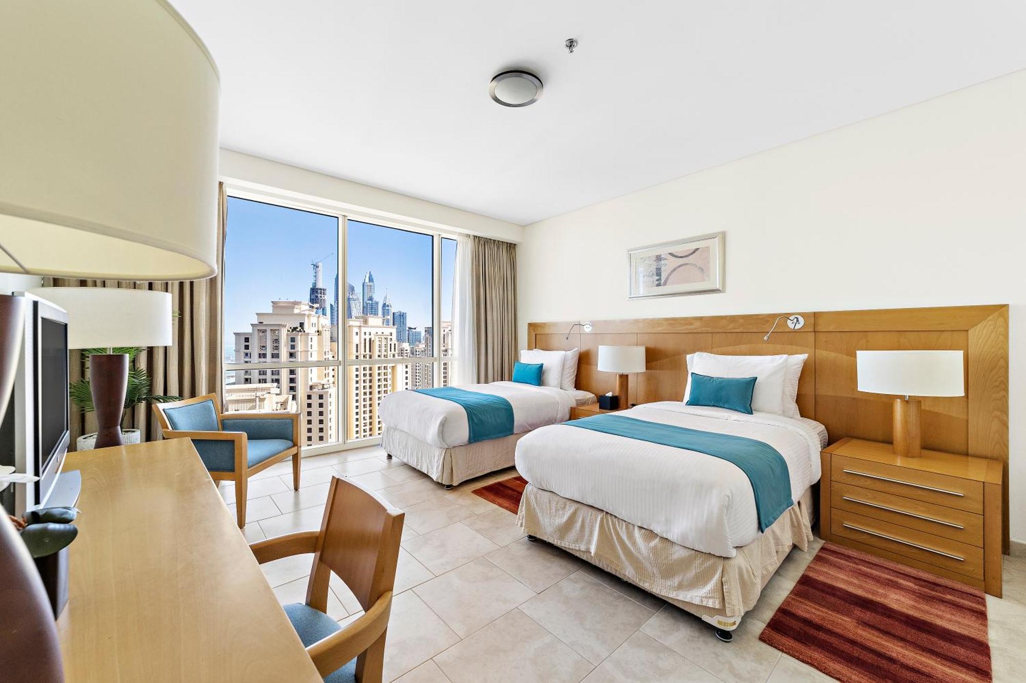 Blue Beach Tower The Walk Jbr Dubai Exterior foto A guest room at the Atlantis Paradise Island